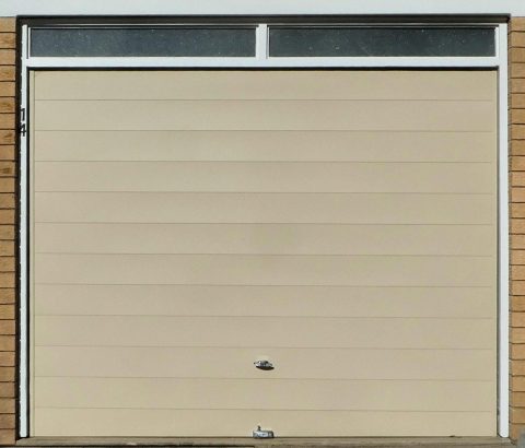 Comment fonctionne une porte de garage sectionnelle ?
